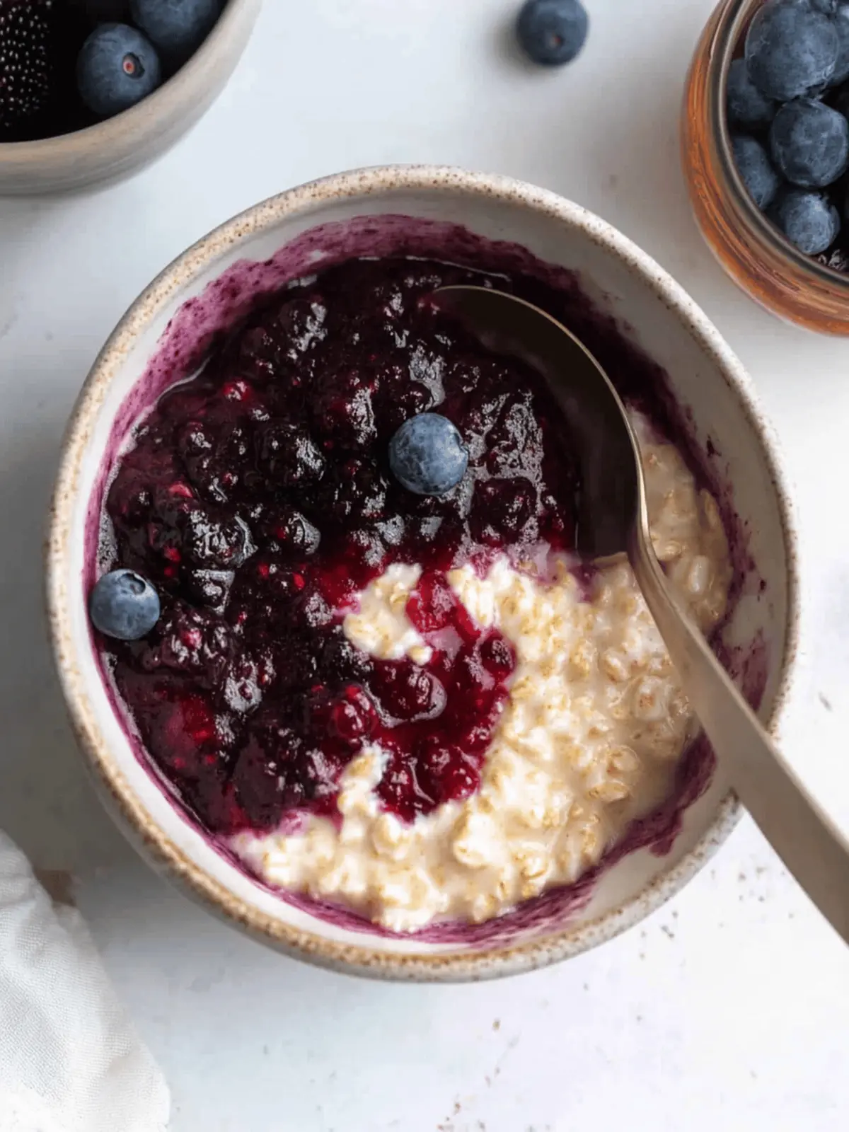 Indulge in Creamy Custard Oats with Berry Compote Delight 4 Custard Oats with Mixed Berry Compote